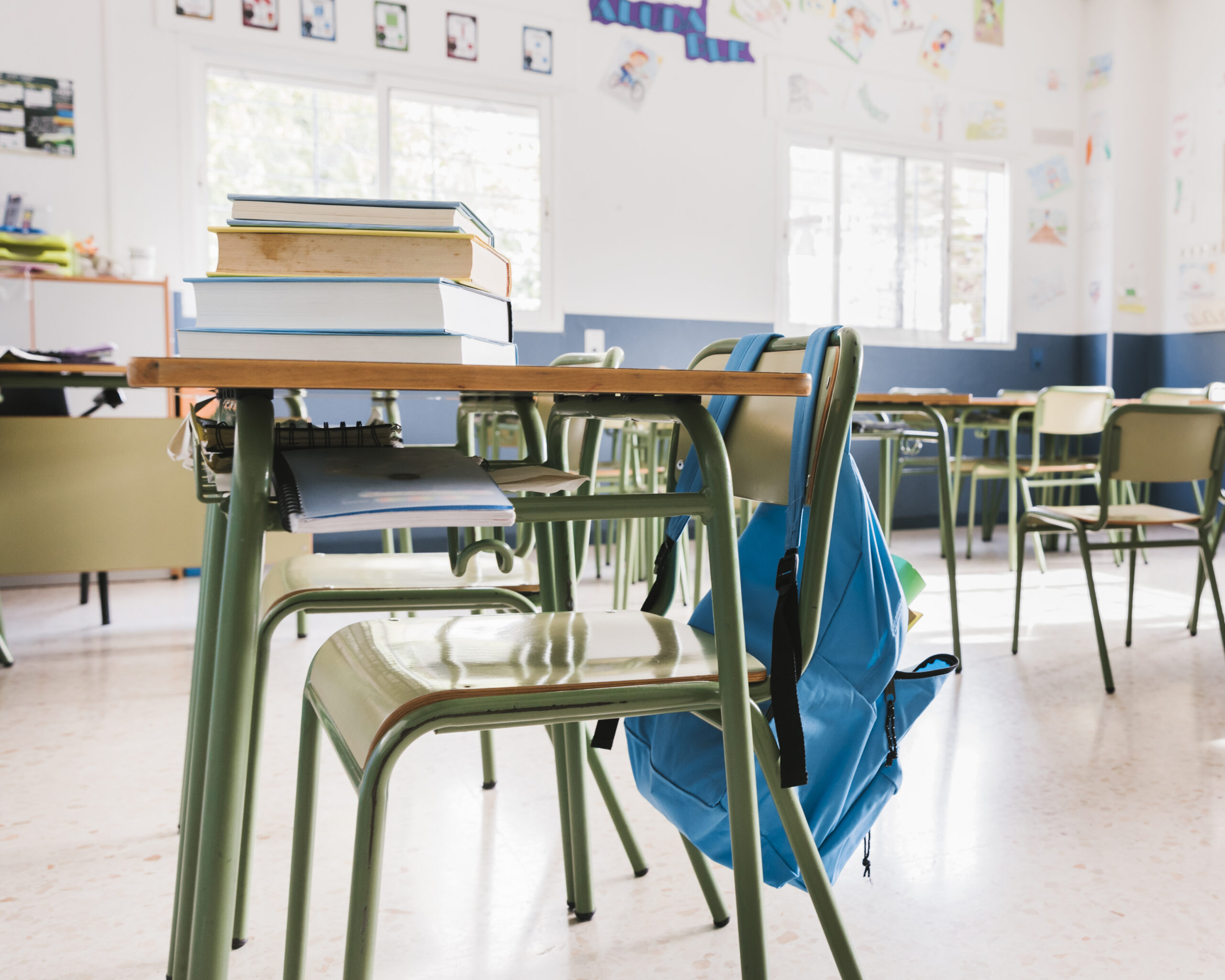 school-classroom-with-books-and-backpack